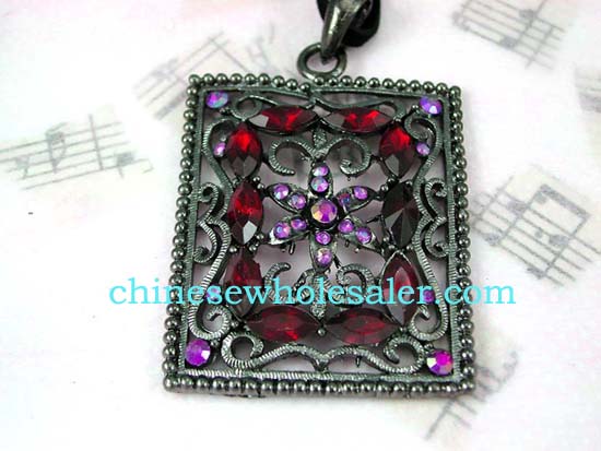 Wholesale crystal fashion import distributors supply Picture frame shape pendant with purple cz flower design at center surrounded by red cz stones atop vine decor and has four purple cz gems in each corner..    
              
        