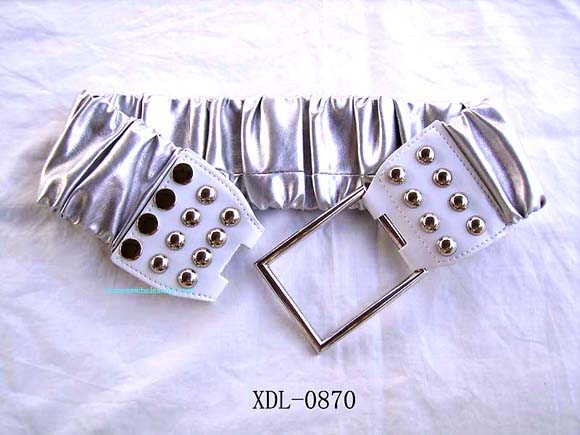 China wholesale gift market distribution company supplying fashion accessories. Imitation white silk around thick elastic belt with studs uniquely patterned by thin silver square buckle.