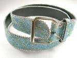 Wholesale beaded belts impoted from China factory. Fun baby blue belt with green graffiti art design and round silver beads outlining