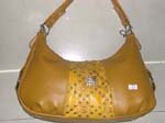 Brown ladies purse with smoky pattern design and shiny chips inlaid