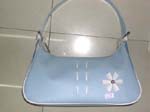 Long shape blue teen's purse with white flower design