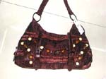 Shiny brown lady's purse with wooden beads design