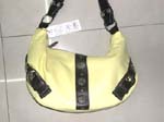 Yellow leather lady's handbag with knot design