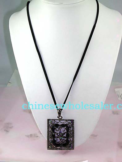 Wholesale fashion cz jewelry from China wholesaler. Picture frame shape pendant with colored cz flower design at center surrounded by black cz stones atop vine decor and has four multicolored cz gems in each corner..    
              
        