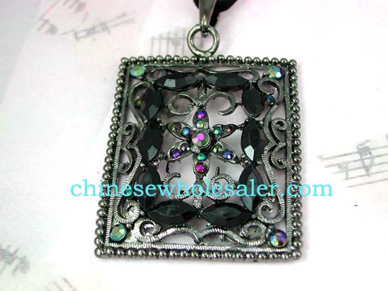 Wholesale fashion cz jewelry from China wholesaler. Picture frame shape pendant with colored cz flower design at center surrounded by black cz stones atop vine decor and has four multicolored cz gems in each corner..    
              
        