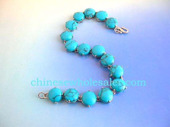 Fashion turquoise jewelry supplied at wholesale price. Turquoise gemstone jewelry from China manufacturer supply Tigers eye fashion bracelet in round shape with S lock for closure    .    
              
        