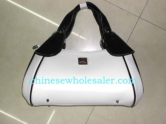 Quality faux leather handbag supplier sells women fashion accessories. White imitation leather handbag Chanel inspired with black handle and lining at sides. Zipper closure for center pocket     


   