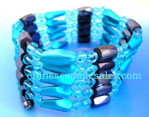 China wholesale therapy jewelry imported for retail purchase. light Blue rhinestones, long blue cylinder beads and faceted cylinder shape magnetic hematite beads inlaid. Can be a necklace, bracelet,or arm band
        
