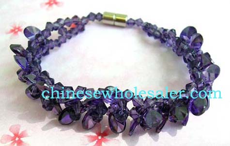 Jewelry online distributiob business importing made in China products. Amethyst-purple bracelet created from multiple Chrystals with screw-up clasp for attachment.         
 
   