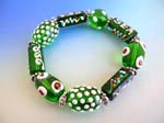 China direct supplies glass charm bead bracelet wholesale gifts. Fashion stretchy green bracelet with multi white brown hand-painted Chinese lampwork glass bead and flat silver beads design 