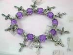 Religious cross jewelry Supplied by online China gift shop. Light purple beads with silver cross charms and flowery beads on strecthy charm bracelet