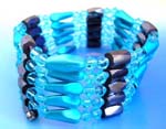 China wholesale therapy jewelry imported for retail purchase. light Blue rhinestones, long blue cylinder beads and faceted cylinder shape magnetic hematite beads inlaid. Can be a necklace, bracelet,or arm band