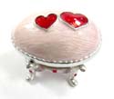 Enamel jewelry box motif an egg shape with red double heart pattern in pinky color, magnetic lock design