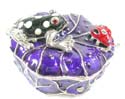 Enamel jewelry box motif a black frog catching a red bug on porcelain leaf, enamel in purple color