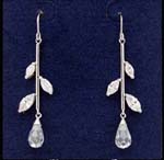 Wholesale crystal jewelry distributed by online wholesalers. Threader earing with tear drop figure cz stones hanging from rhodium plated pole and cz embedded leaves at the sides