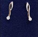 Earring wholesale direct import suppliers  sell cz jewelry. Thick rhodium plated lines holding simulated diamond.