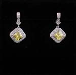 Jewelry catalog gifts distributed wholesale to retail shop. Yellow cz stone centered amisdt clear cz chrystals and hanging from small cz inlaid stud.