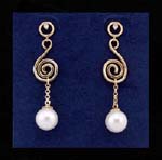 Wholesale earring catalog directory for wholesale gemstone jewelry. Imitation pearls dangling from simulated gold plated spiral poles with cz stone in stud.