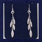 Fine wholesale jewelry supplier distributes fashion earrings direct from China. Threader earings have rhodium plated leaves hanging loosely from chain with cz stone in small circles above
