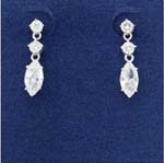 Earring jewelry shop sells wholesale gemtone fashions. tylish oval cz stone suspended from two circular cz chrystals attached by rhodium plated chain