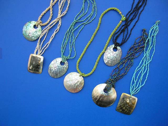 Retail jewelry outsoucing company - Crafted sea shell pendant on beaded necklace