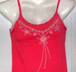 Lady's tank top with embroidered flower on top part