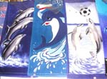 Assorted dolphin towel with playing sport design