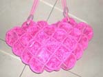 Pinky leather purse in diamond shape design