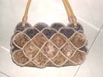 Copper and black leather chips hand bag with smoky floral design