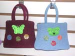 Assorted handbags with butterfly and bear pattern