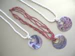 High style jewelry wholesaler exports Unique purple seashell pendant on handcrafted multi string beaded necklace