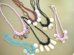 Womens bali wear jewelry manufacturing company distributes Coil designed beaded necklace with multi ocean shell charms 
