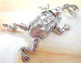 Sterling silver pendant in frog figure design with head, arms and legs movable