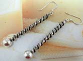 925. sterling silver earring with rope spin holding silver ball at the end 