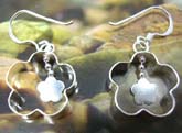 Sterling silver earring in handcrafted flower frame  with a mini flower pattern suspended in middle