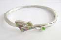 Fashion bangle with assorted color cz synthetic stone embedded central design