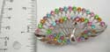 Peacock fashion animal pin features multi rounded cz synthetic stone embedded