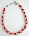 Fashion beaded bracelet in rounded imitation coral and silver flower beads design, lobster claw clasp closure
