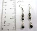 3 small and 1 big black faux stone paired with Bali silver beads forming fashion earring in fish hook back
