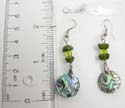 Fashion fish hook earring with green and light green beads on top and a circular abalone seashell dangle hanging on bottom