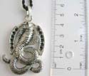 Fashion necklace with black twisted cord string holding a snake mental pendant at center
