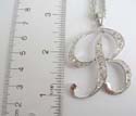 Fashion silver plated necklace holding alphabet letter "B" pendant with multi mini clear cz embedded. Lobster clasp
