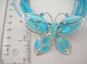 Blue strings fashion necklace in cut-out butterfly design pendant with multi blue cat eye beads embedded. Lobster claw clasp