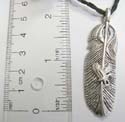 Fashion necklace with black twisted cord string holding a feather pendant with an eagle pattern at center. Adjustable for all sizes