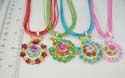 Fashion necklace with multi one color strings holding assorted enamel floral pendant at center. Assorted color randomly pick