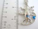 Fashion necklace with black thick cord string holding an animal insect pendant with blue cz embedded. Lobster clasp