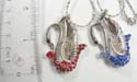 Fashion necklace holding swan feature pendant with multi cz stone embedded on bottom. Lobster clasp