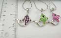 Fashion necklace holding fish pendant with multi mini cz stone embedded, lobster claw clasp. Assorted color randomly pick