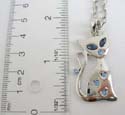 Fashion necklace holding a cat feature pendant with blue cz synthetic embedded. Lobster claw clasp